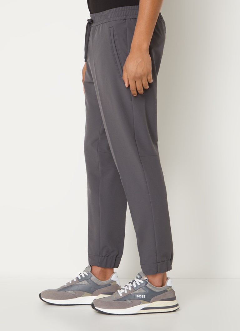 Pantaloni de trening HUGO BOSS T_Flex cu croială slim și buzunare laterale.