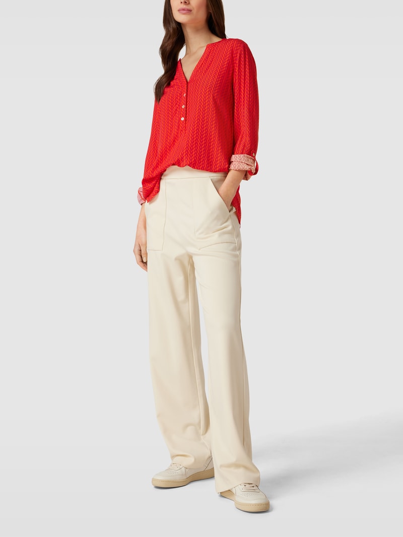 Blusenshirt mit Allover-Muster in dunkel orange