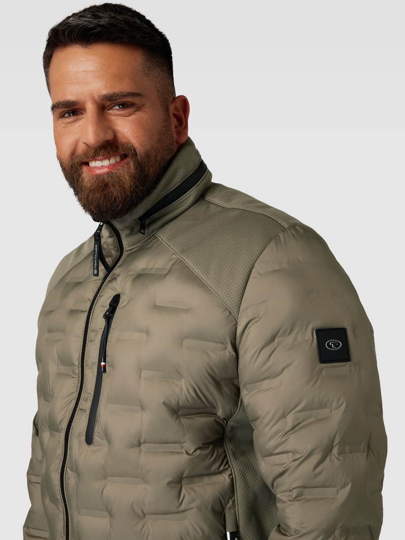PLUS SIZE Steppjacke mit Brusttasche Modell 'Hybrid' in olivgrün