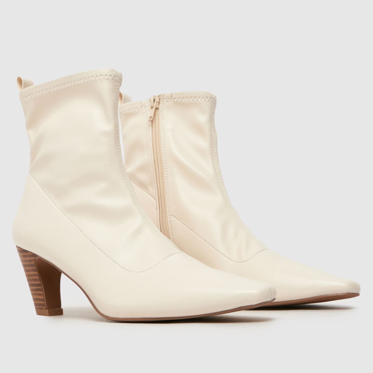 Schuh – Aries – Stretchiga sockstövlar med klack och benvita