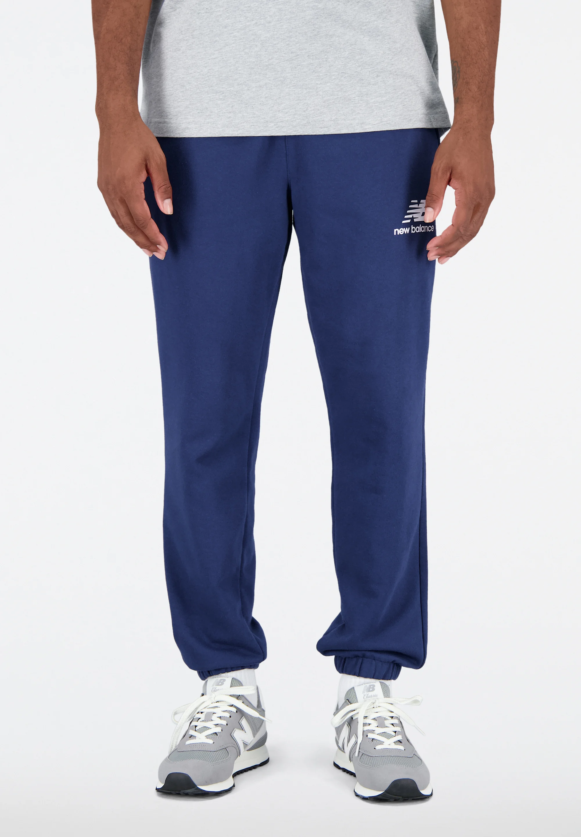New Balance ESSENTIALS STACKED LOGO - Pantalones de chándal