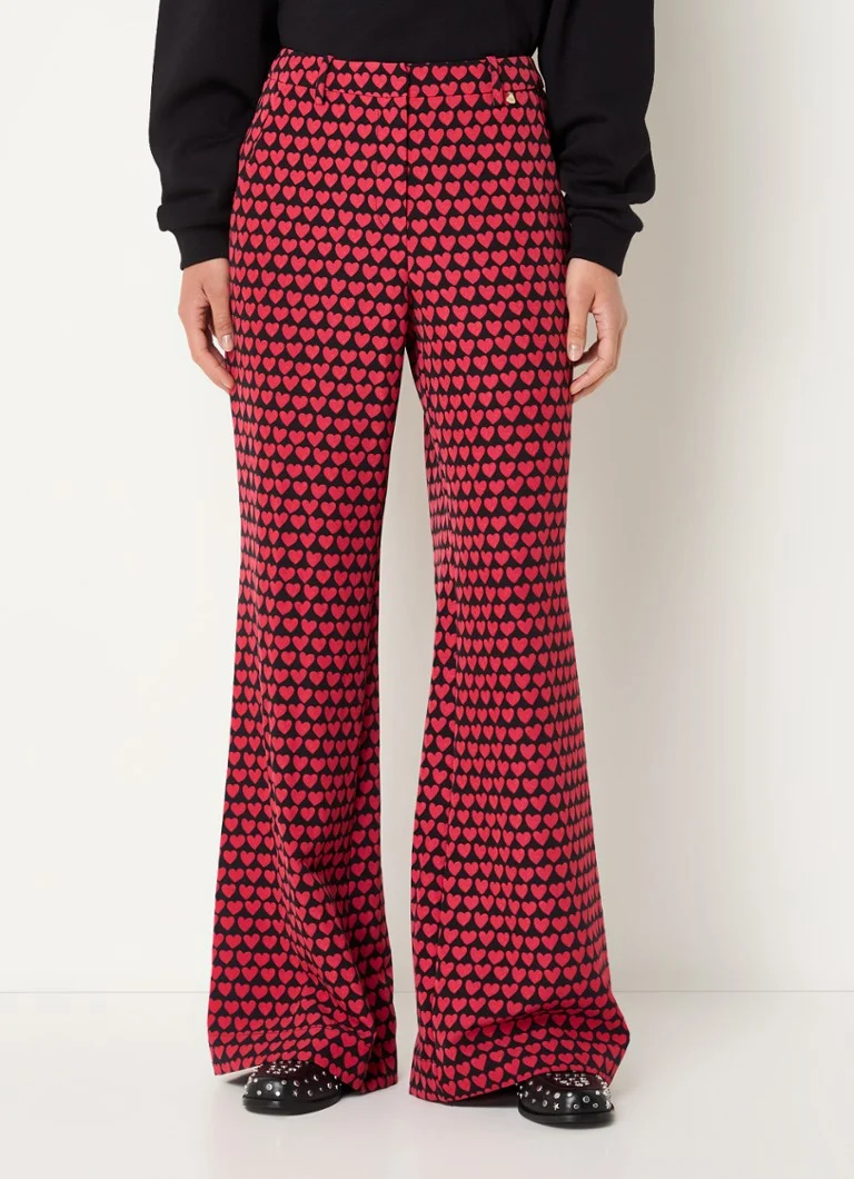 Pantaloni Fabienne Chapot Puck, evazați, cu talie înaltă, imprimați și cu buzunare laterale.