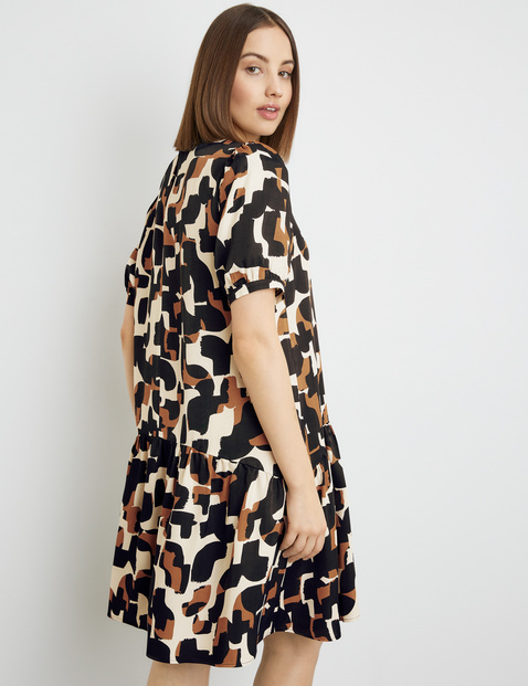Kleid mit Puffärmeln und Volant