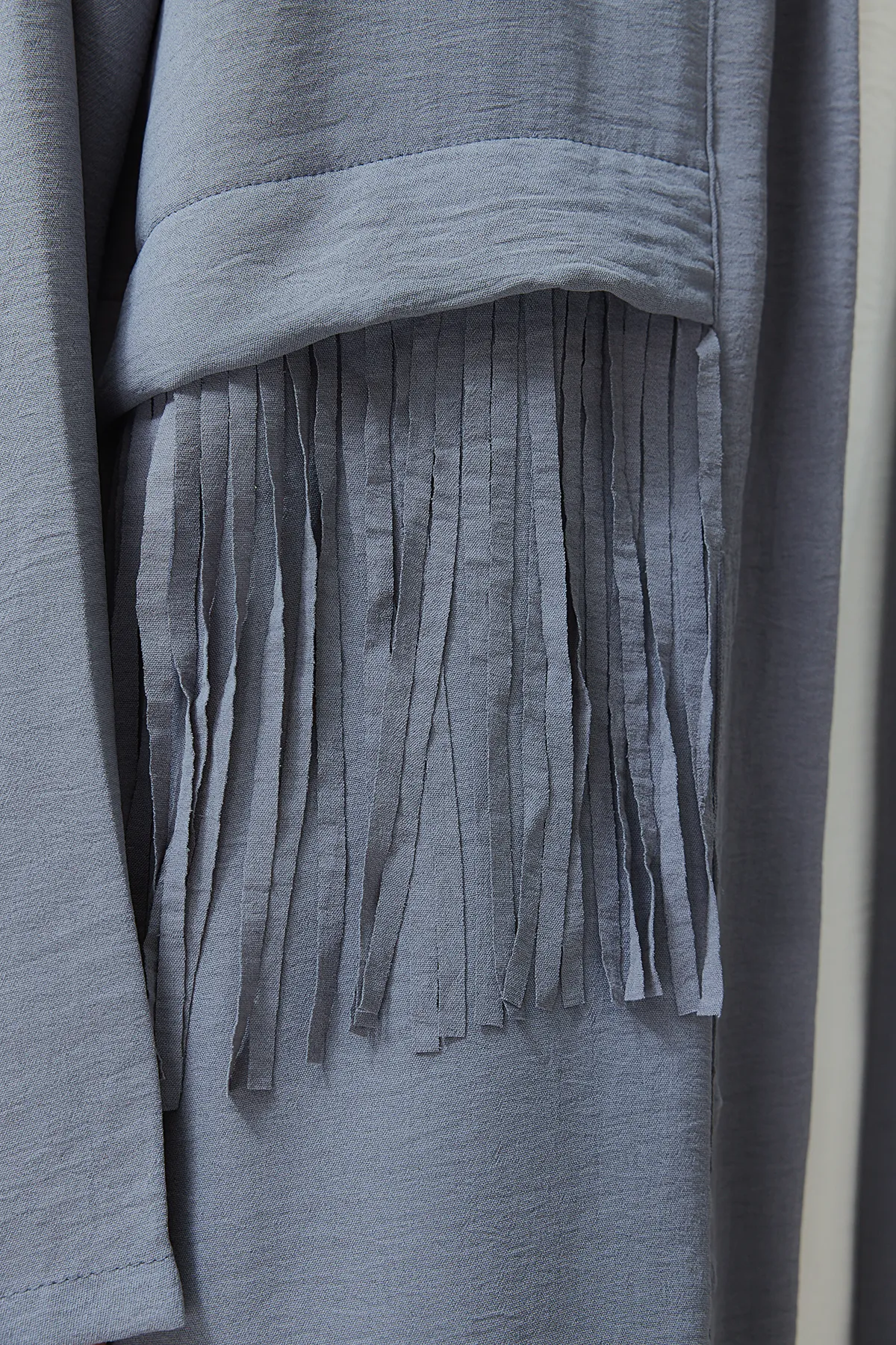 Trendyol Modest  Graue gewebte Aerobin-Kappe mit Quastendetails und Ferace TCTSS24KF00014