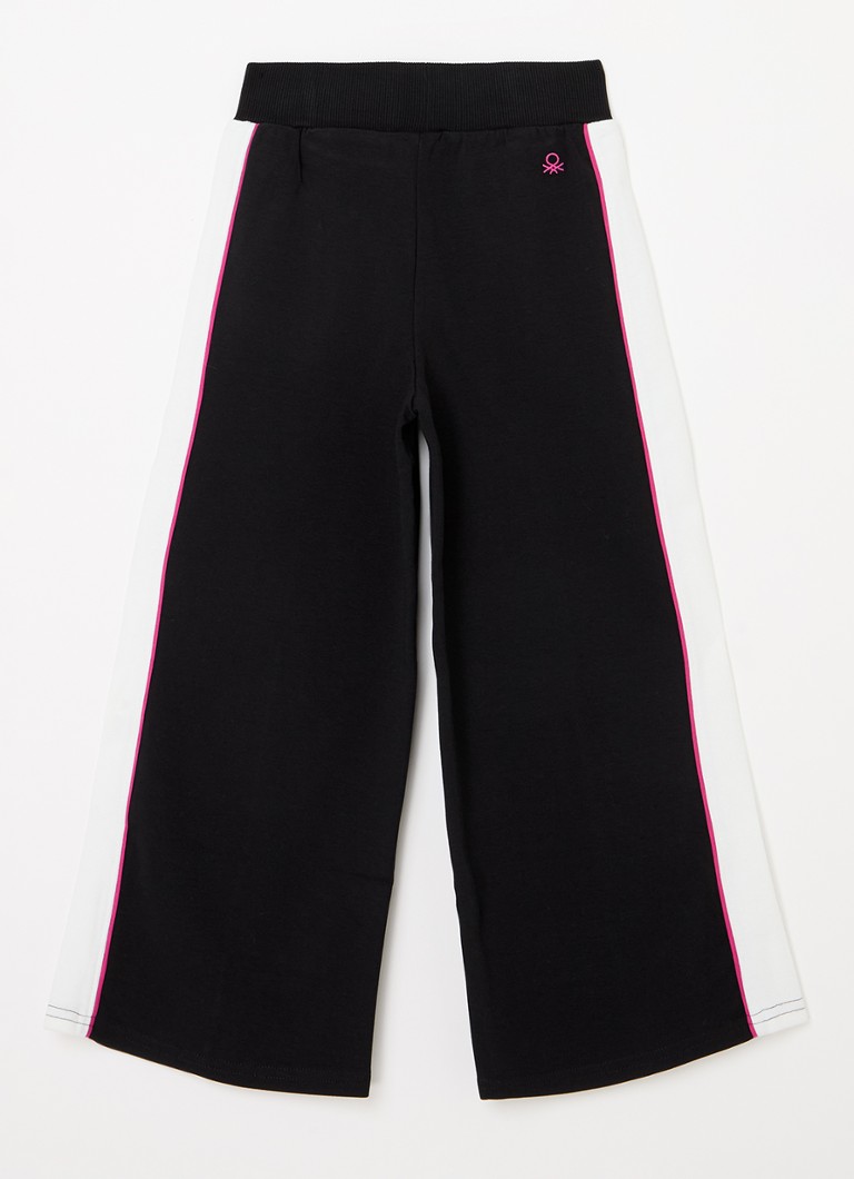 Pantaloni de trening Benetton cu croi larg și logo brodat.