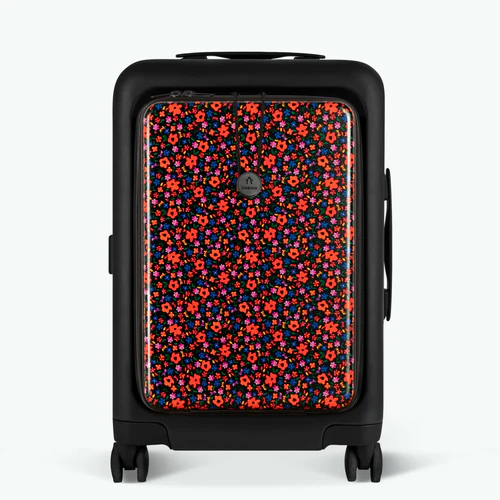 ORLY 4-wheel hard-shell suitcase with MAD black pouch