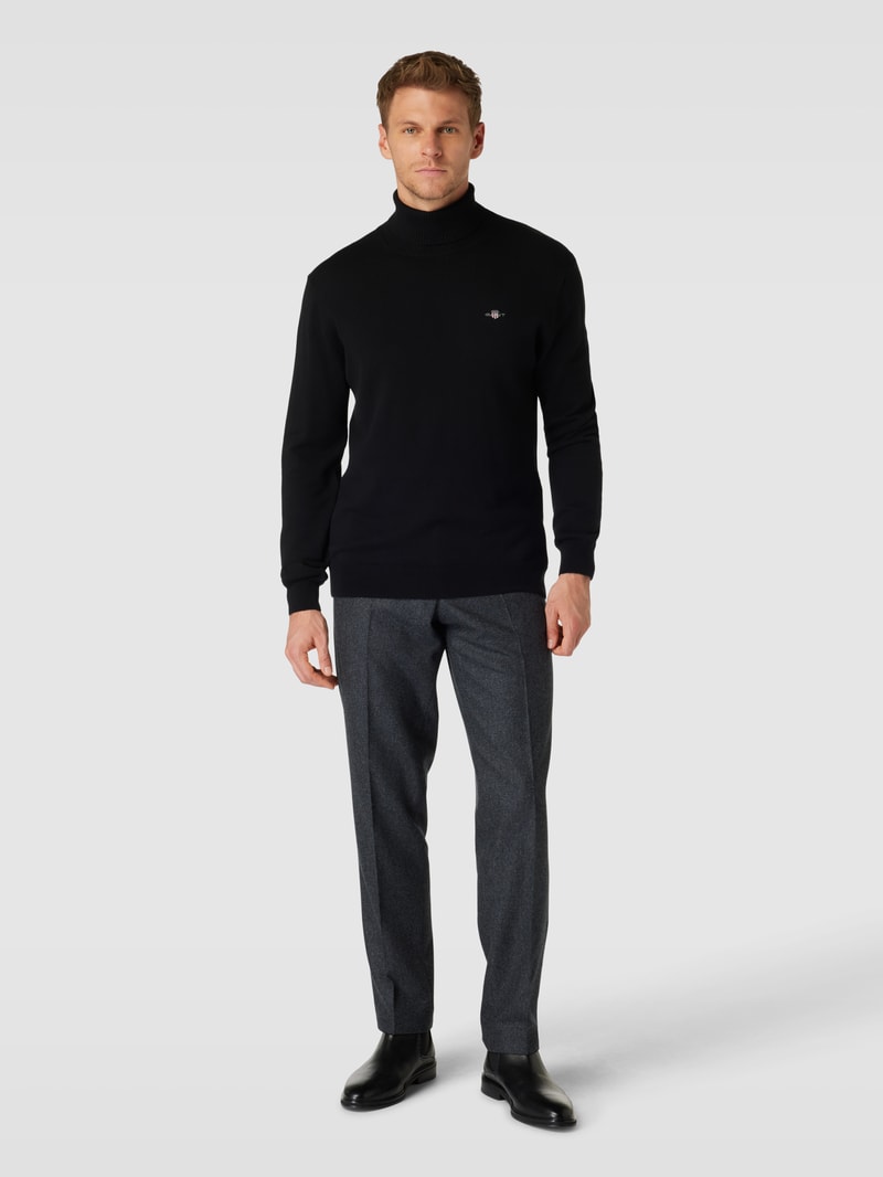 Rollkragenpullover mit Label-Stitching aus Baumwoll-Woll-Mix in schwarz