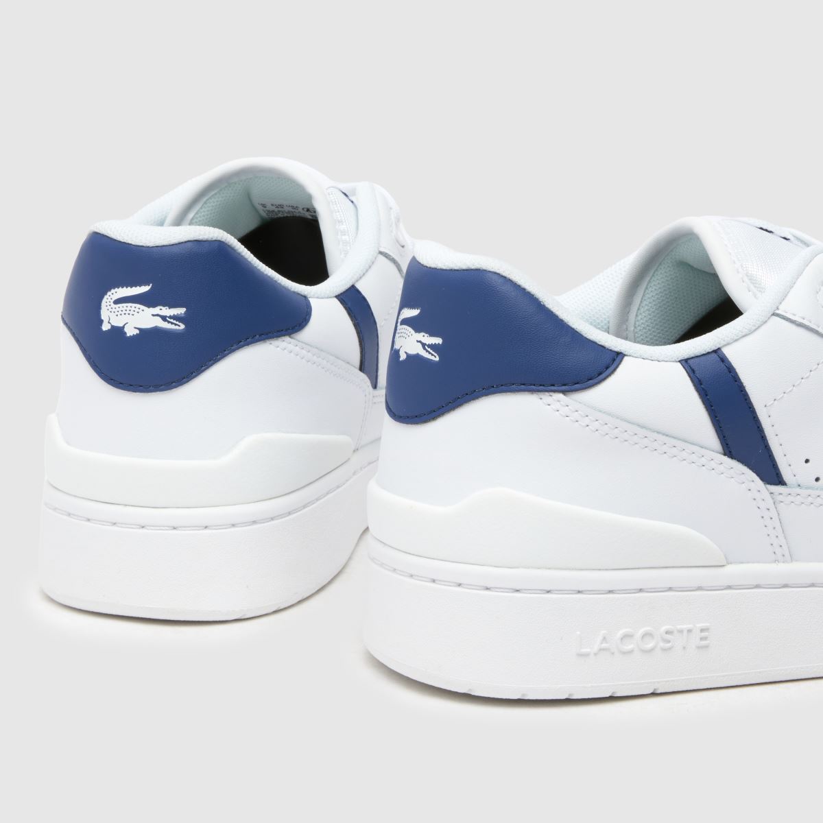 Lacoste – Vitt och marinblått set med t-clips