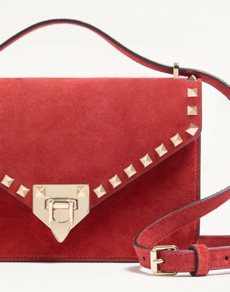 Bolsa de ombro pequena Valentino Garavani Rockstud em camurça