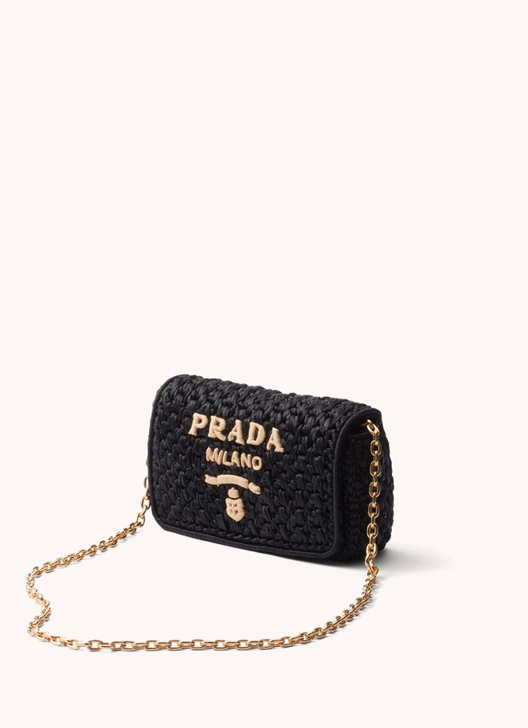 Prada raffia-olkalaukku logolla