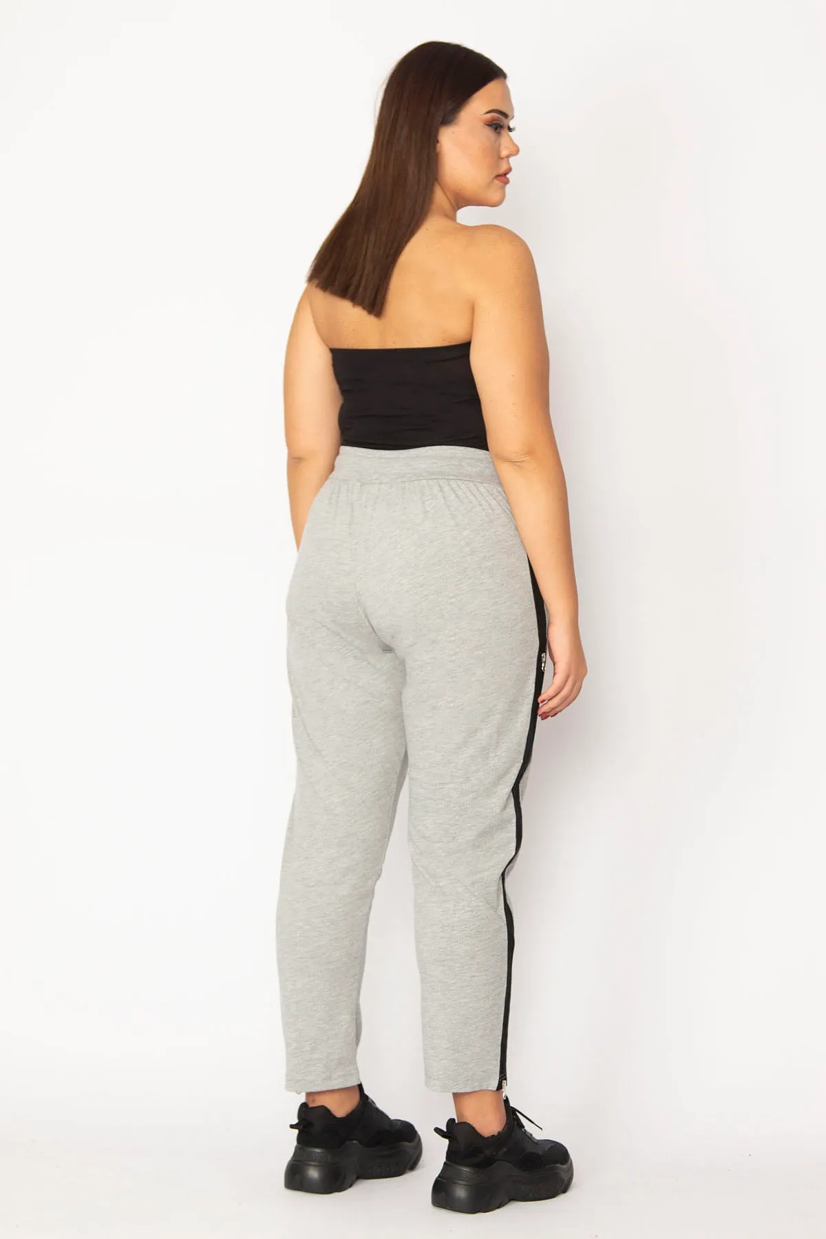 Şans  Graue Kombi-Hose mit Reißverschluss und elastischem Bund für Damen in großen Größen und beidseitiger Öffnung 65n29190