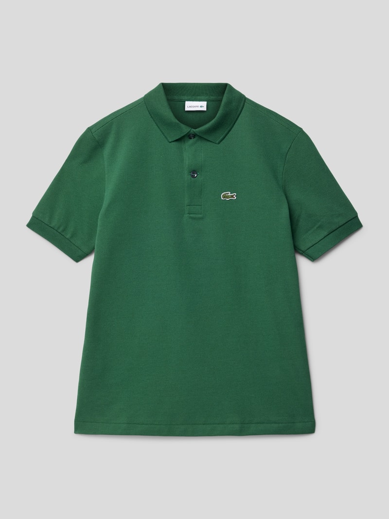 Poloshirt mit Label-Applikation in grün