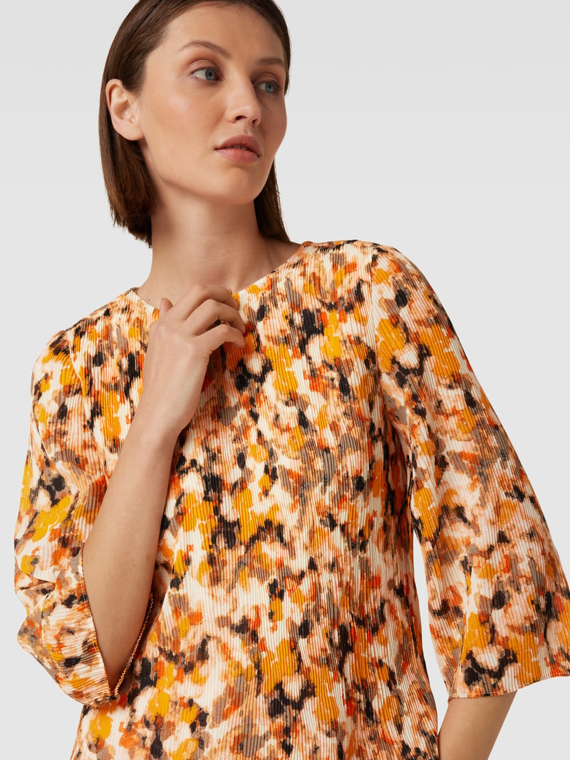 Bluse mit Plisseefalten in ecru