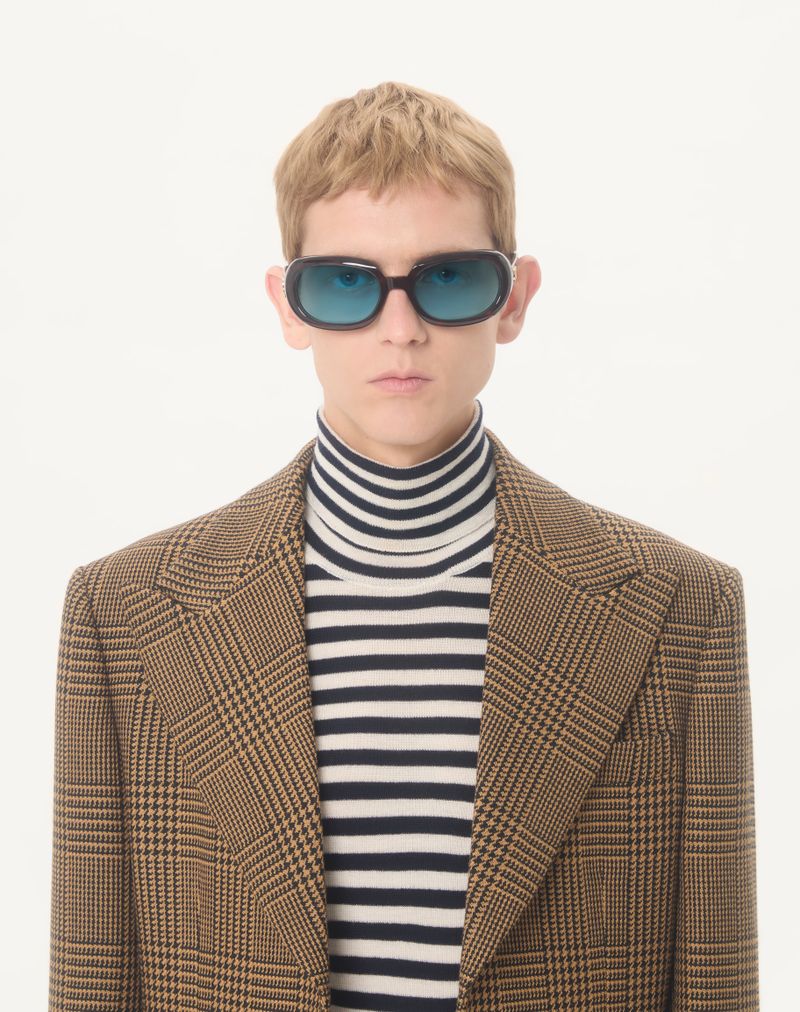 Valentino wollen jas met enkele rij knopen en Welsh Check-patroon.