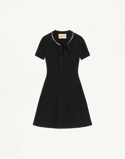 Gebreide jurk met borduursels
