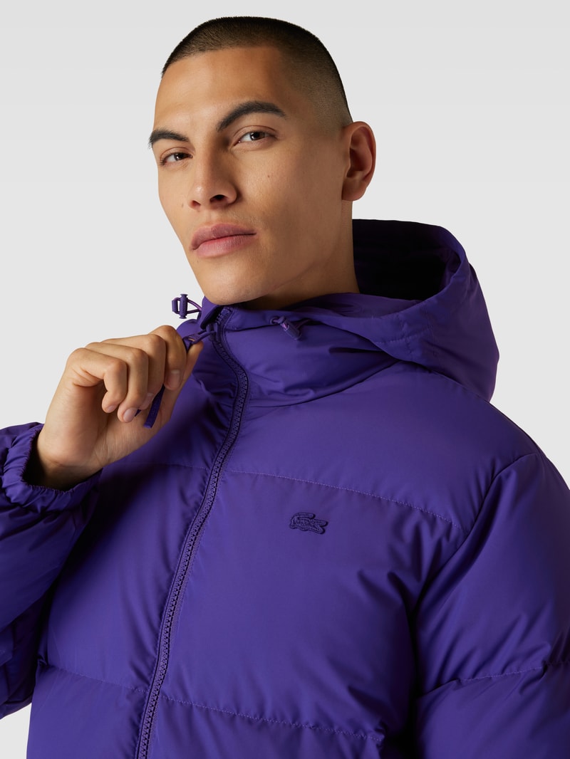 Steppjacke mit Kapuze in lila