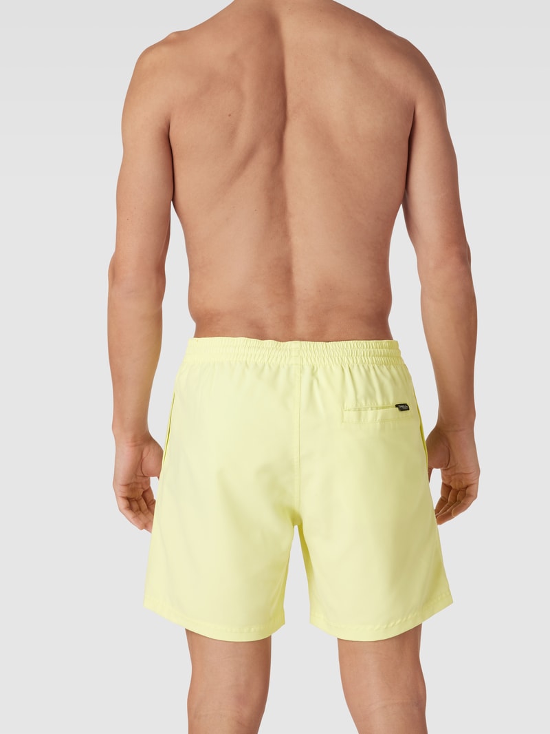 Badehose mit Label-Print Modell 'Cali' in neon gelb