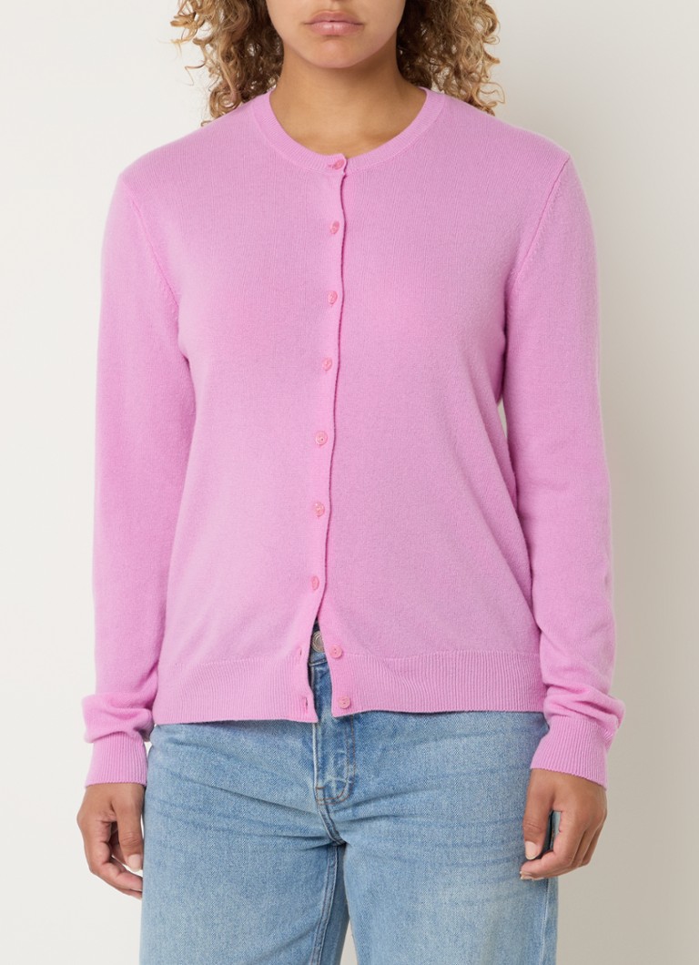 Cardigan Benetton cu guler rotund, confecționat din lână fină.