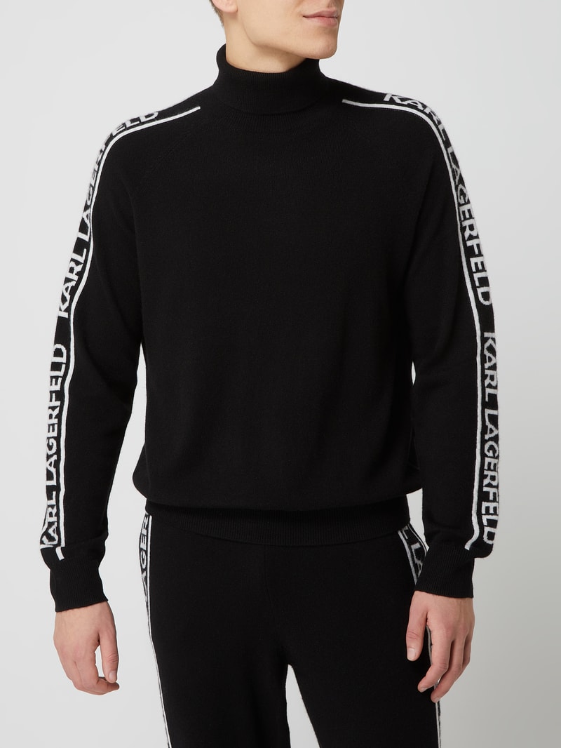 Rollkragenpullover aus Kaschmir in schwarz