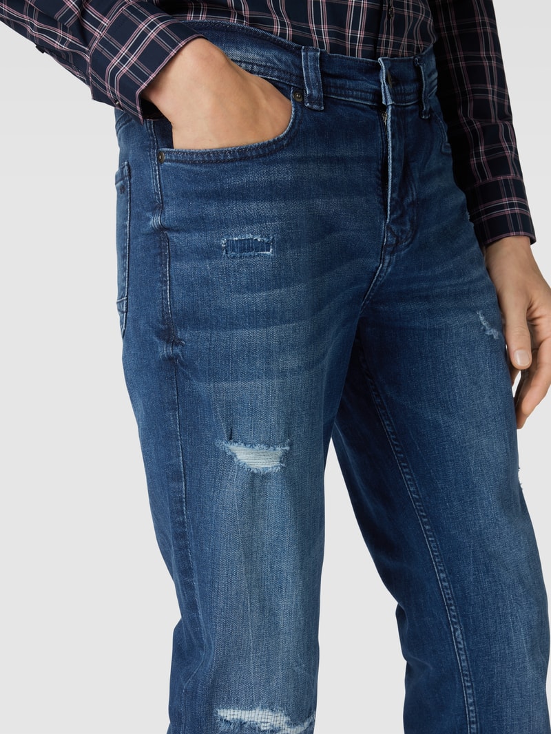 Jeans im Used-Look in himmelblau
