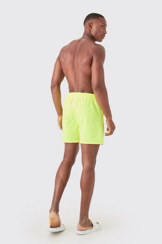 Man Signature mittellange Badehose