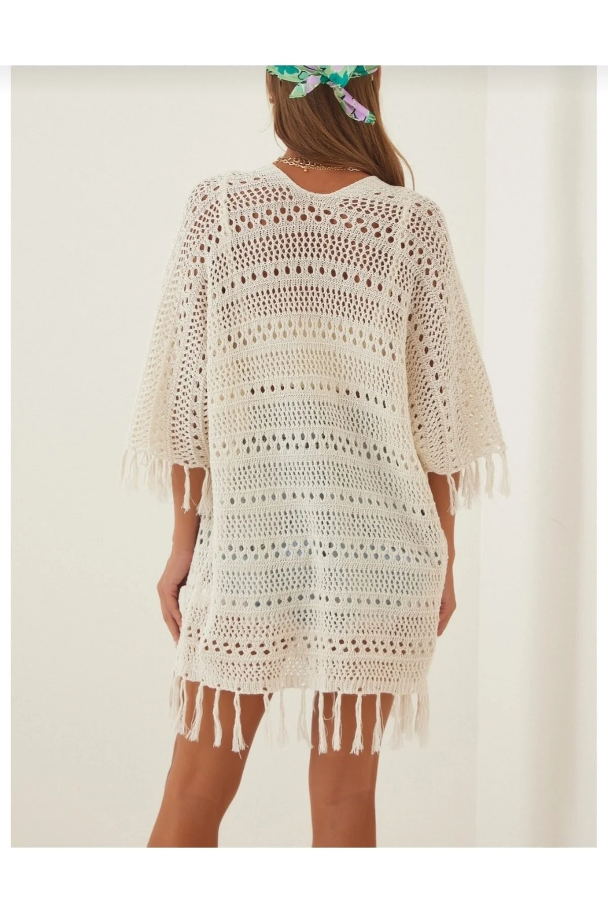 Happiness İstanbul  Cremefarbene, gebogene Strickjacke mit Quasten für Damen MW00067