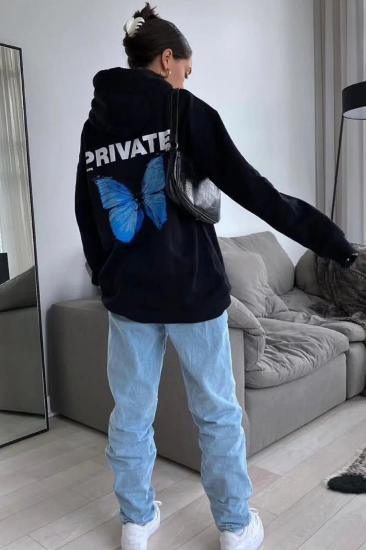 MODAGEN  Schwarzes, übergroßes Kapuzen-Sweatshirt mit Private-Back-Print für Damen