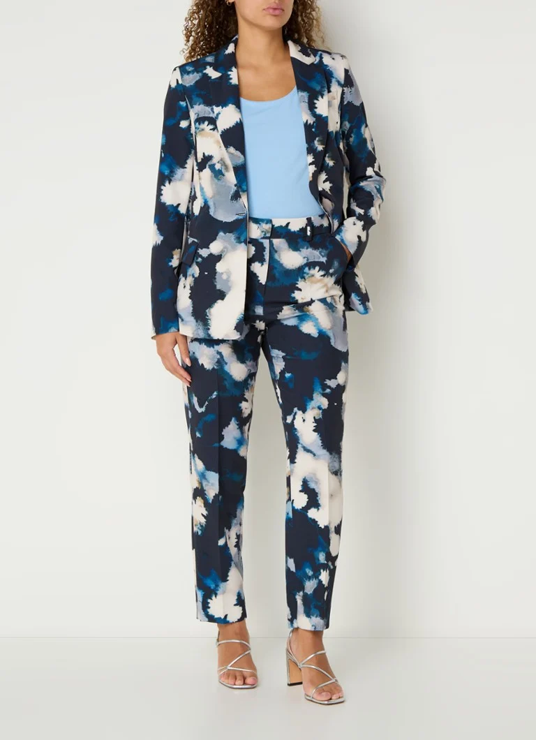 Pantaloni slim fit a vita alta di Claudia Sträter con stampa tie-dye e tasche laterali.