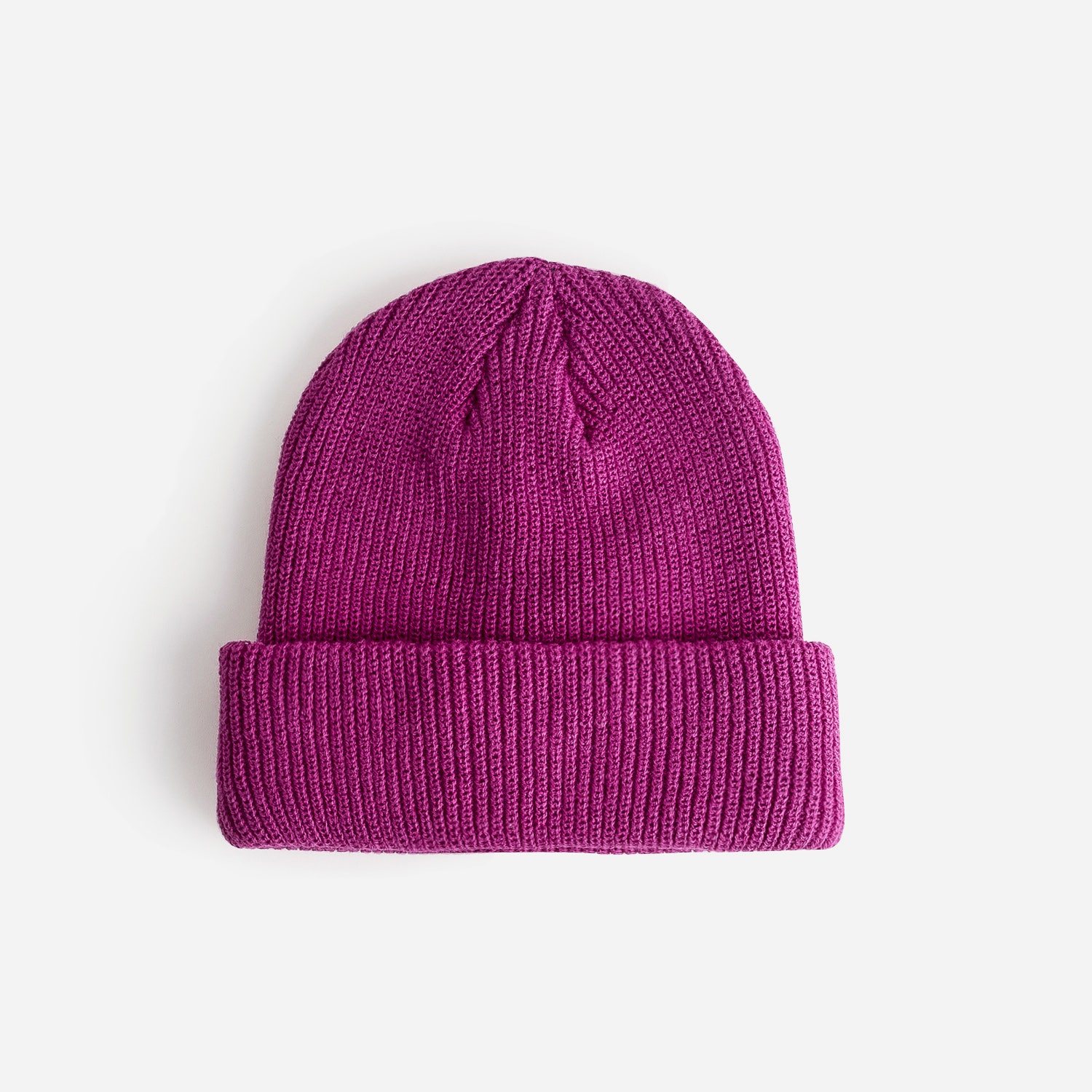 Bonnet TEXTO rose fuchsia en tricot