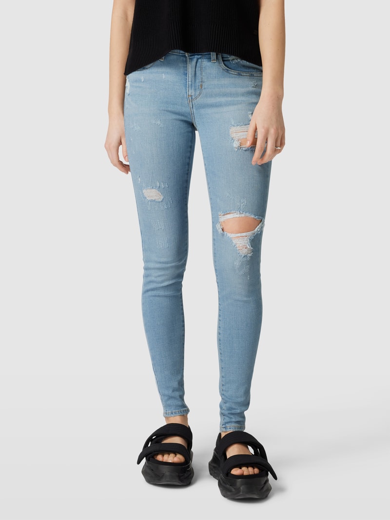 Super Skinny Fit Jeans mit Destroyed-Details Modell '710' in hellblau