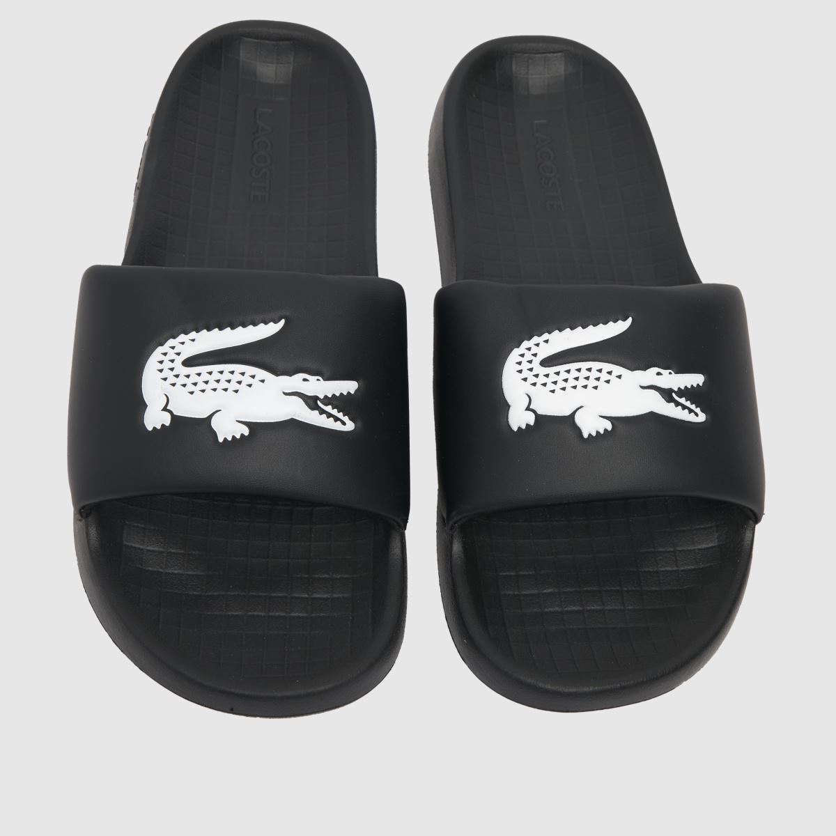 Lacoste – Serve 1.0 – Svarta och vita sandaler