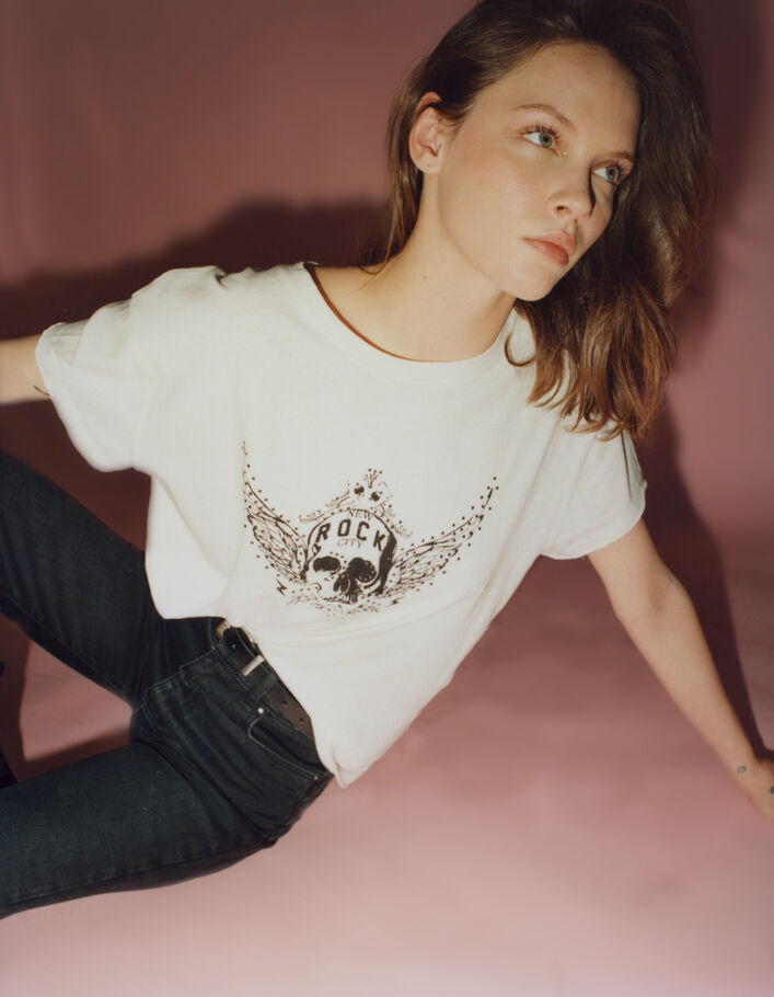 Tee-shirt blanc cassé visuel tête de mort ailée Femme