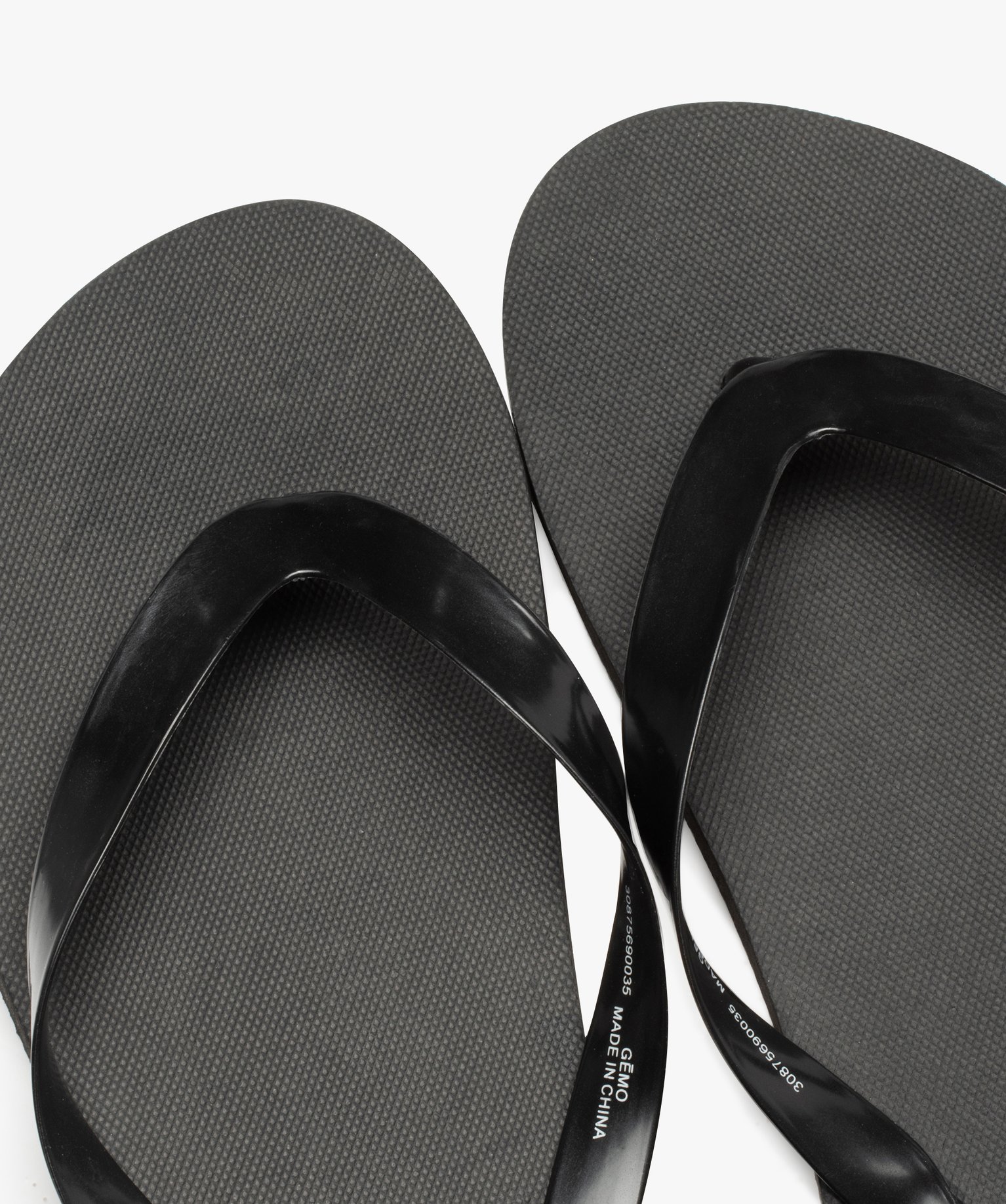 Tongs homme unies à brides lisses noir | GEMO
