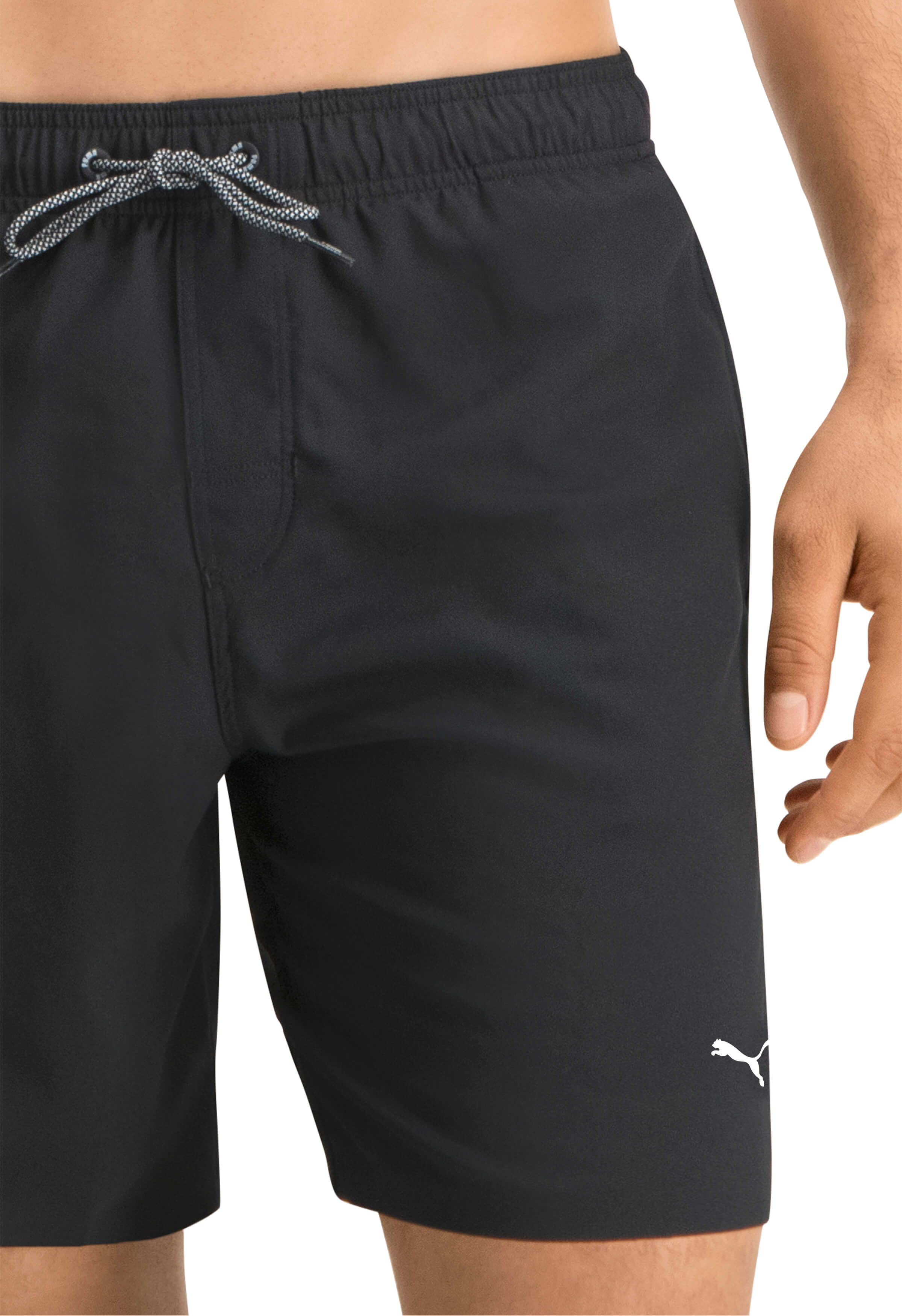 Puma mittellange schwarze Badehose