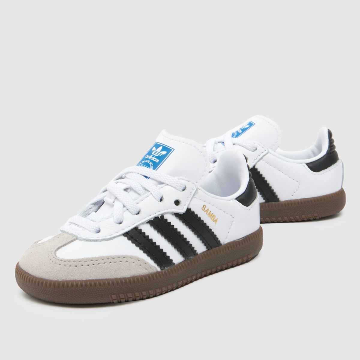 adidas vita och svarta samba och småbarnsskor