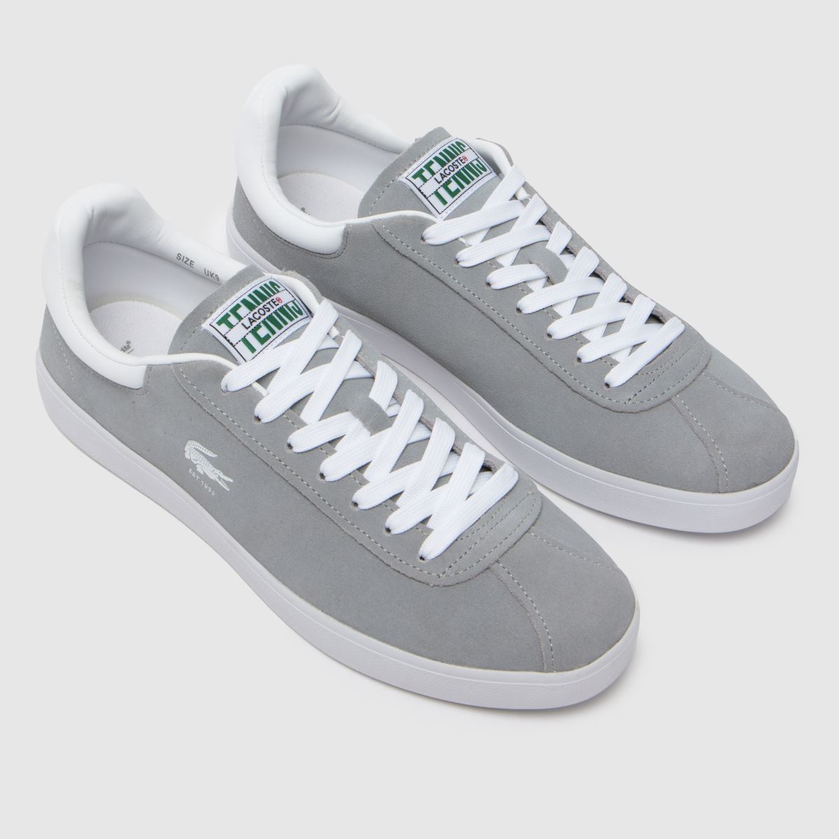 Lacoste – Baseshot-sneakers i vitt och grått