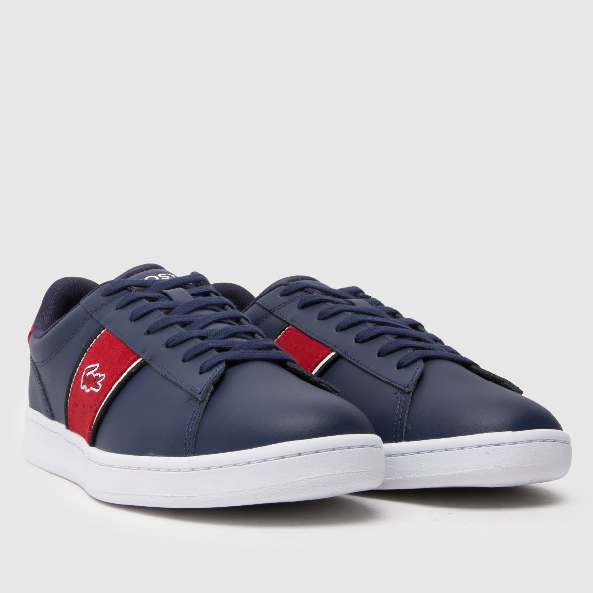 Lacoste – Carnaby – Marinblå och röda träningsskor