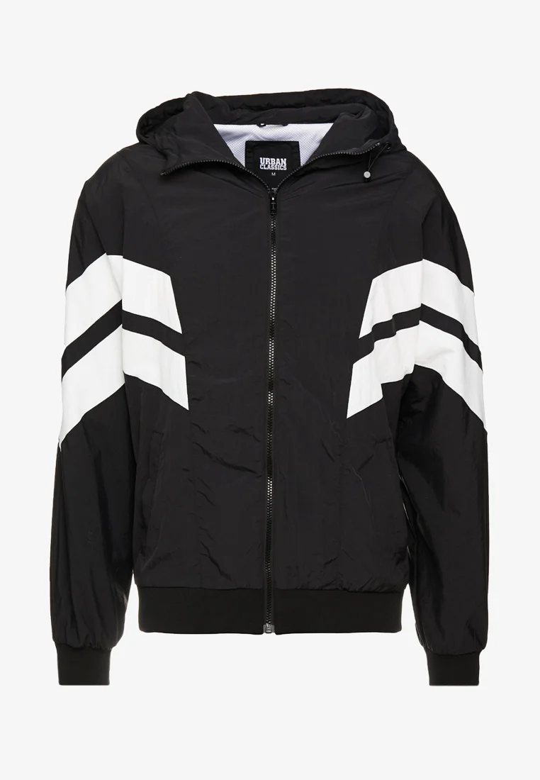 Chaqueta deportiva con paneles arrugados de Urban Classics - Chaqueta ligera