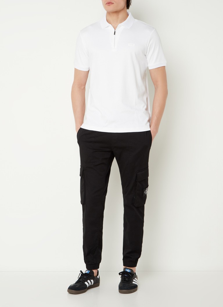 Polo Calvin Klein de corte regular com logotipo e meio zíper.