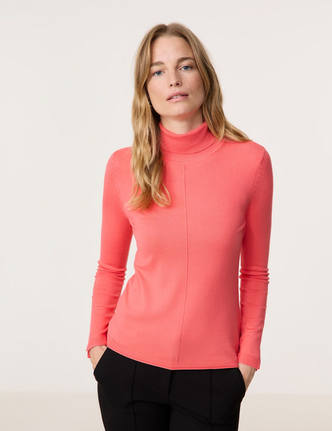 Rollkragenpullover mit Armschlitzen