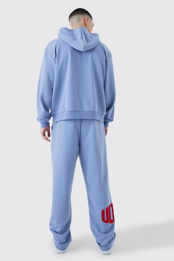 Jogginghose mit geradem Bein und Borg-Applikation