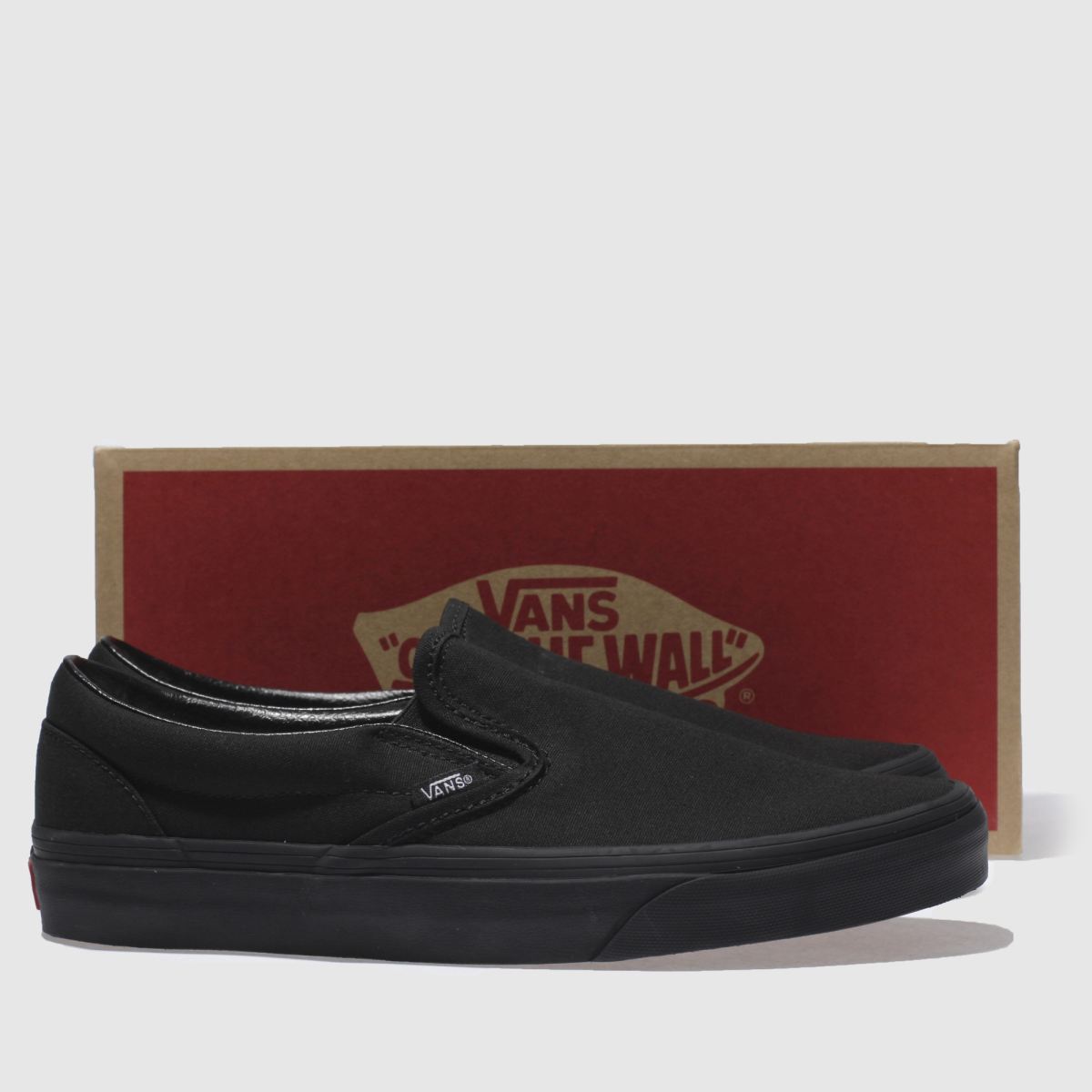 Vans – Klassiska slip-on-sneakers i svart