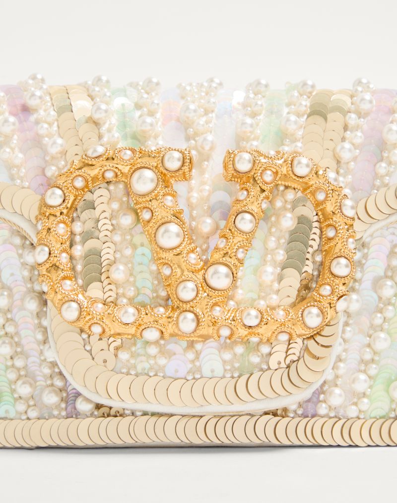 Bolsa de ombro pequena Valentino Garavani Locò bordada com logotipo de joia