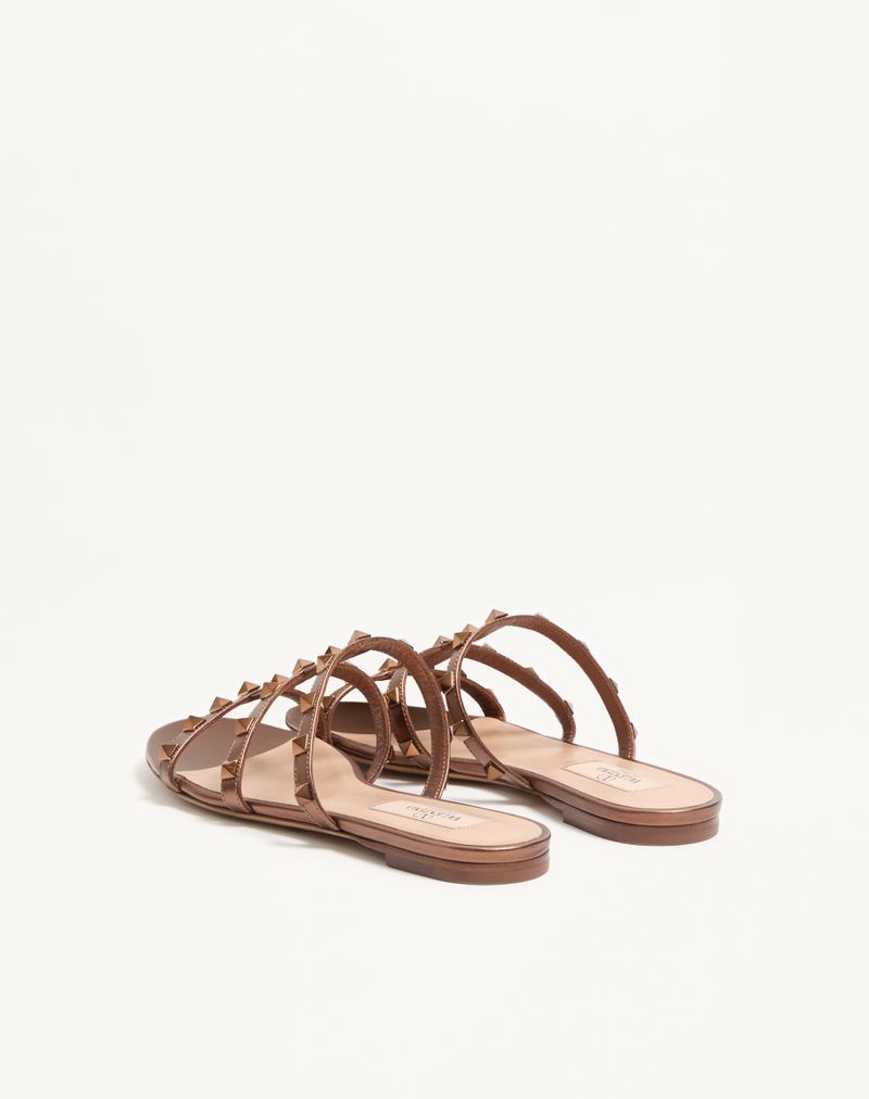 Rockstud lage teenslipper van gelamineerd nappaleer