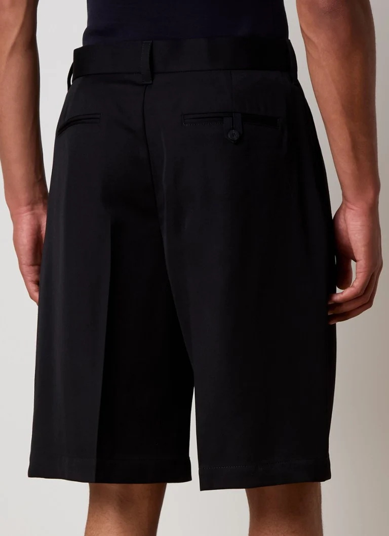 Pantaloni Jacquemus cu croi larg și crop, din amestec de in cu dungi în relief.