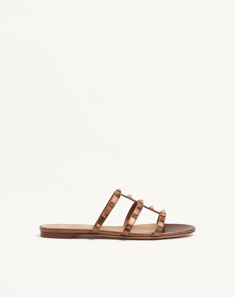 Rockstud lage teenslipper van gelamineerd nappaleer