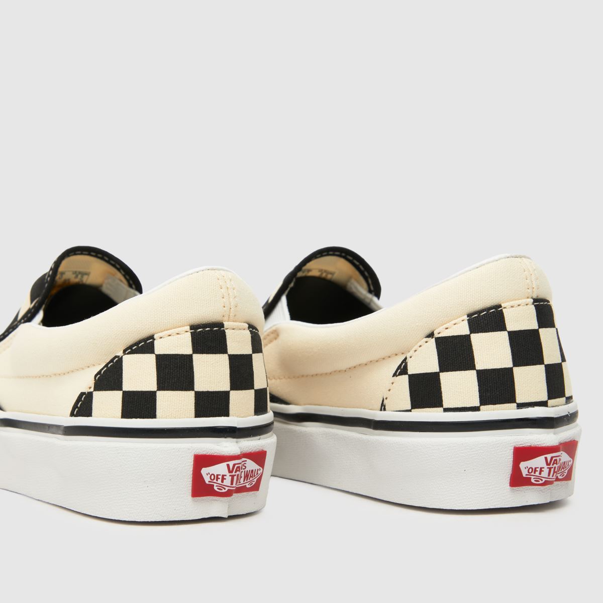 Vans – Schackrutiga klassiska slip-on-sneakers i svart och krämfärgat