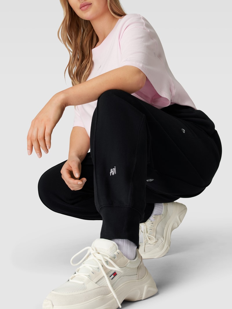 PLUS SIZE Sweatpants aus reiner Baumwolle mit Label-Stitching in schwarz