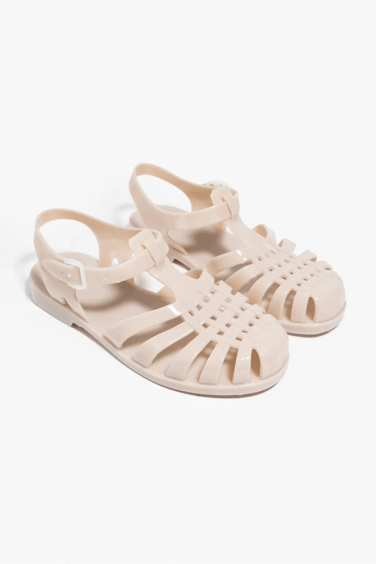 NİŞANTAŞI SHOES  Anderline Cremefarbene, matte Damensandalen mit Gürteldetail