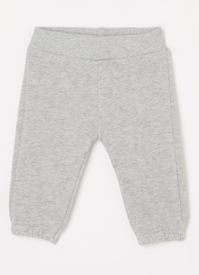 Pantaloni de trening Benetton cu croială conică și broderie.